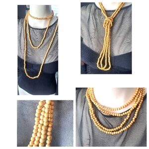 Set of two strands of wooden beads neklace